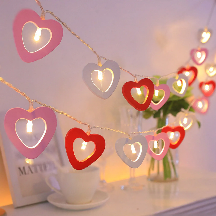 Decorative LED string lights with wooden motifs