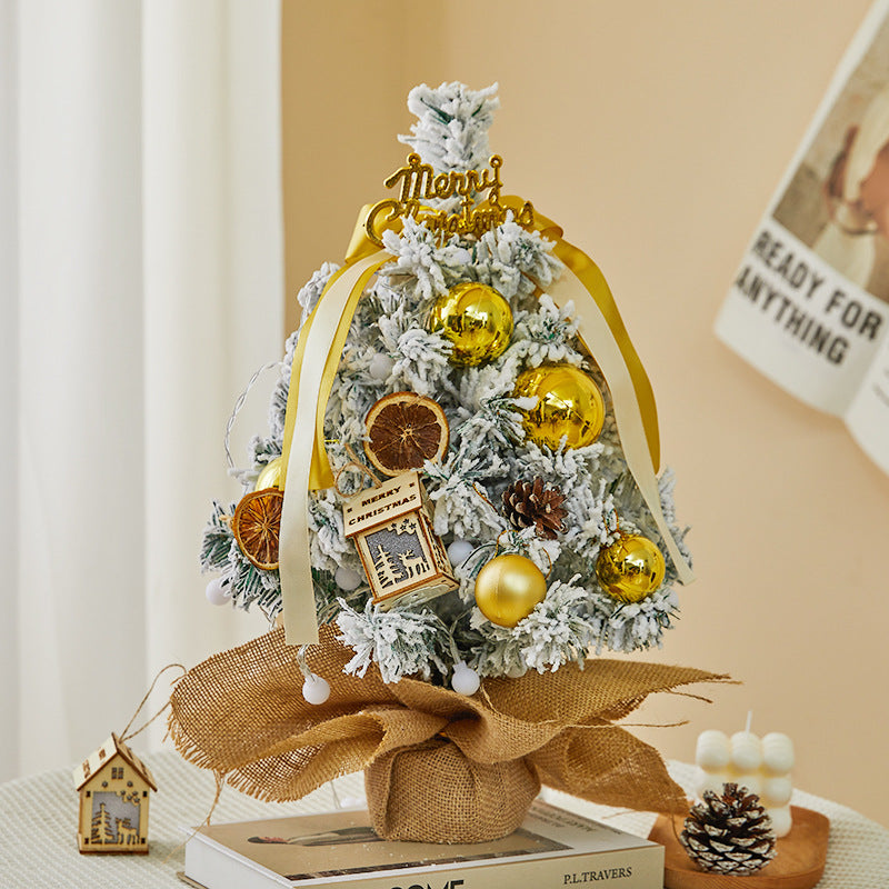 Flocked mini Christmas tree, festive table decoration