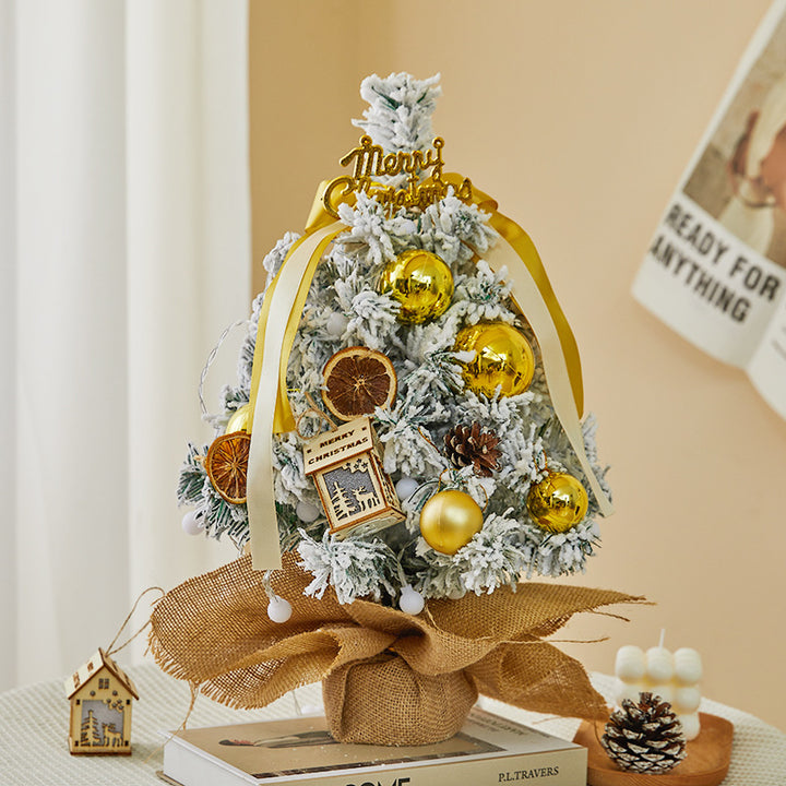 Flocked mini Christmas tree, festive table decoration
