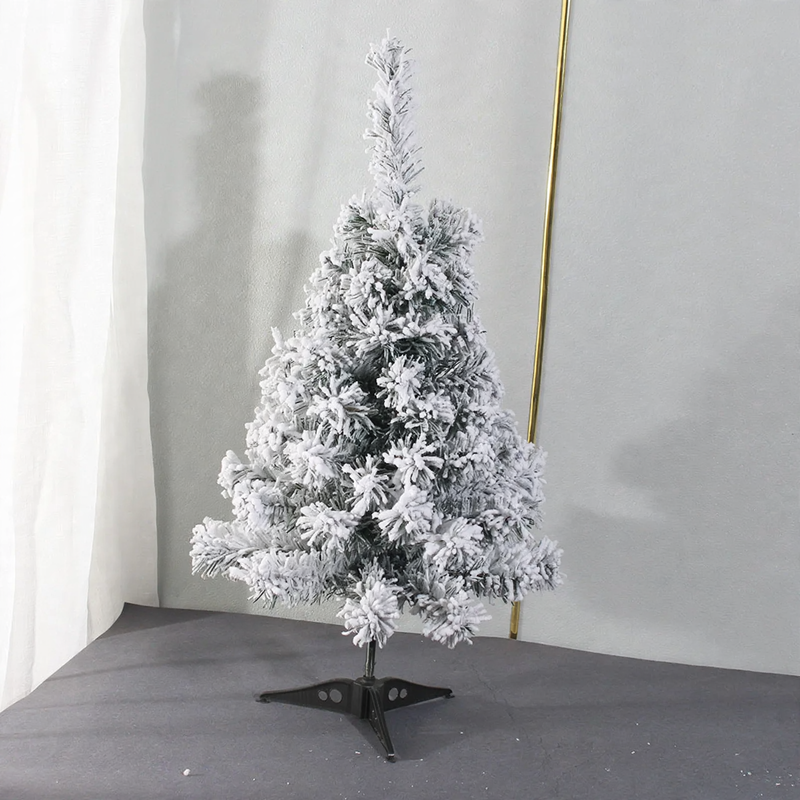 Mini Christmas tree for the table, snow-covered, with lighting