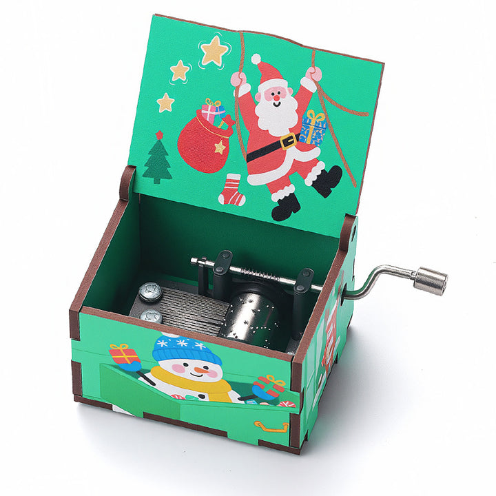 Wooden music box with Christmas motifs, hand-operated