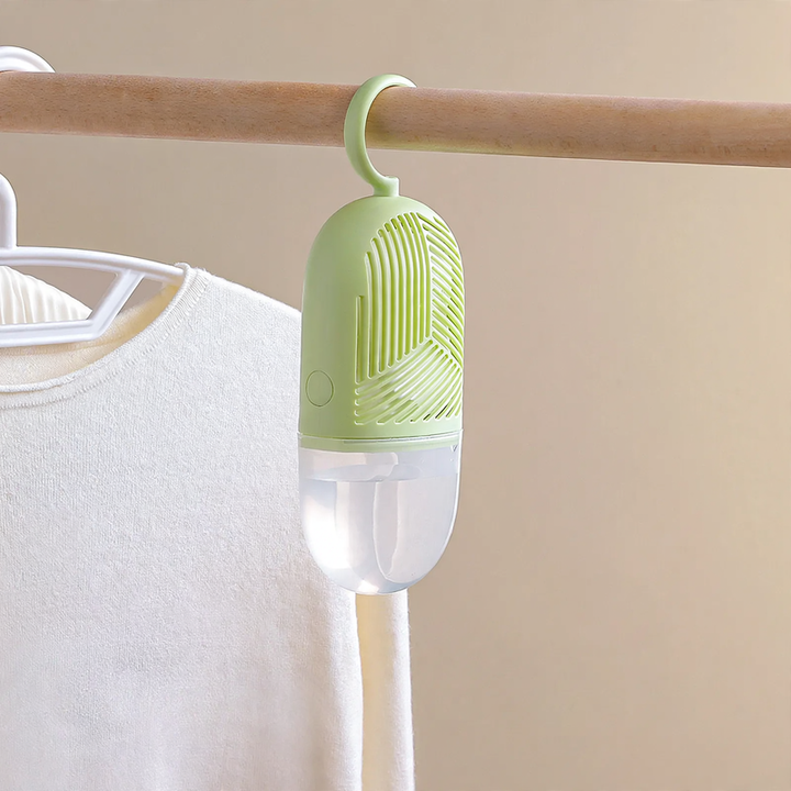 Hanging dehumidifier bag for wardrobes