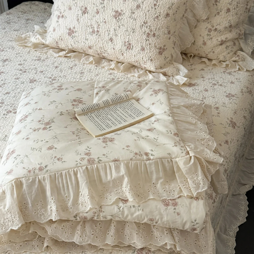 Cotton bedspread with lace trim, quilted