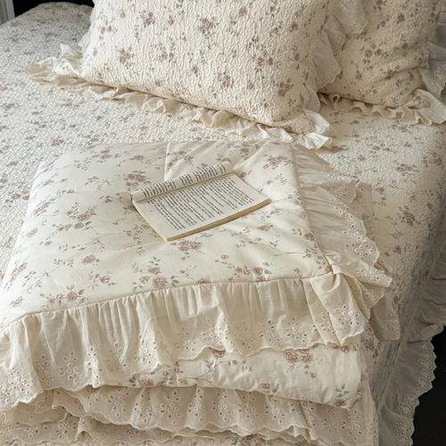 Cotton bedspread with lace trim, quilted