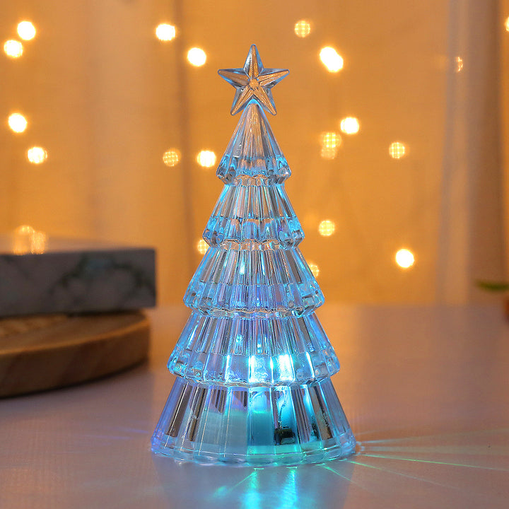 Illuminated mini Christmas tree as table decoration
