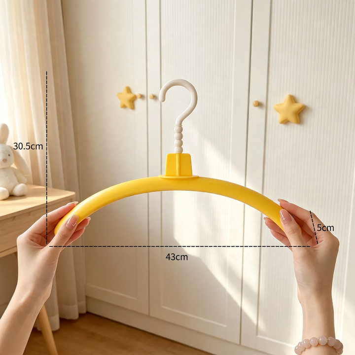 Plastic clothes hanger with monster design