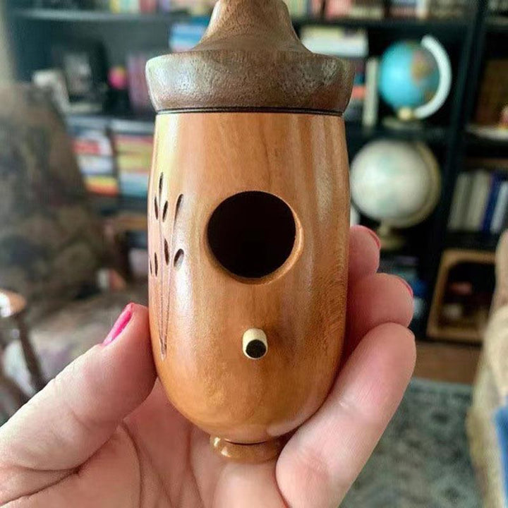 Decorative wooden birdhouse for the garden