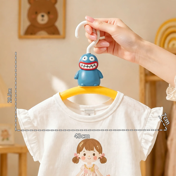 Plastic clothes hanger with monster design