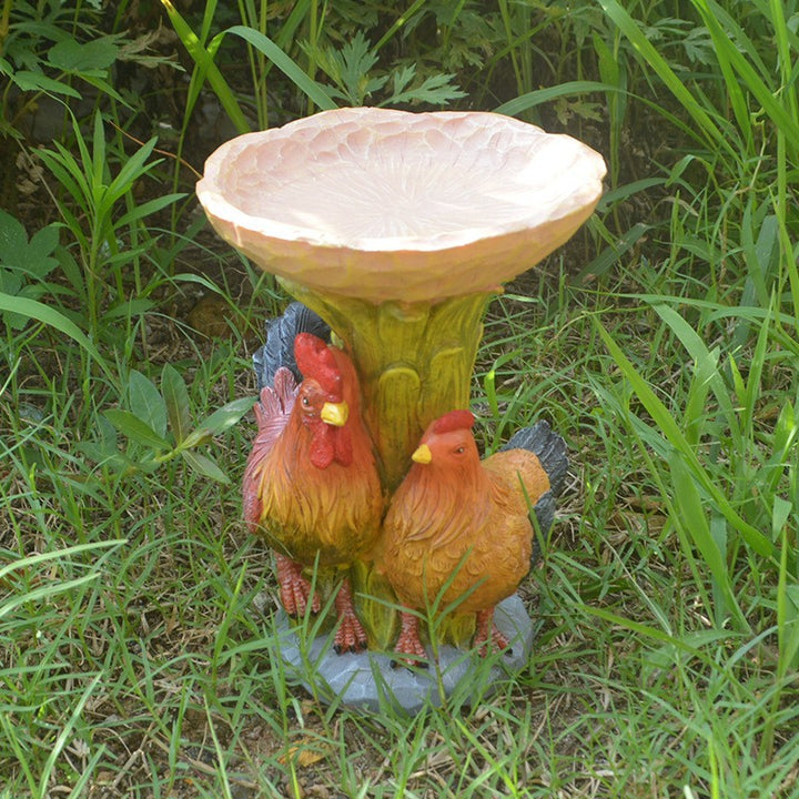 Decorative animal-bird feeding station made of synthetic resin