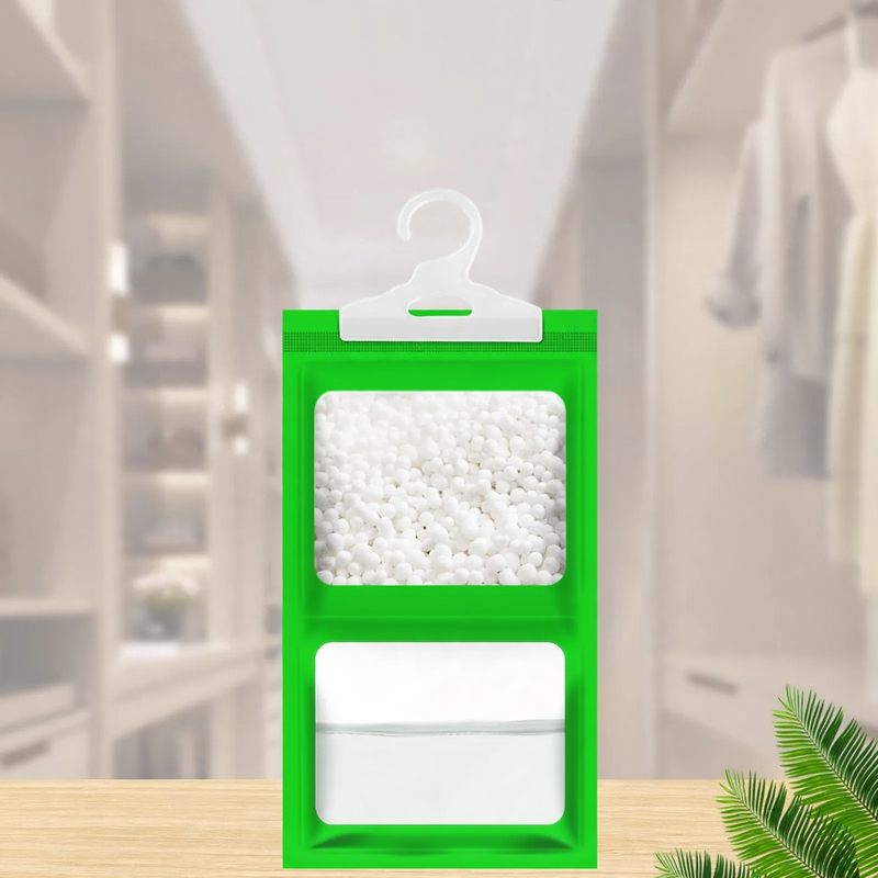 Hanging dehumidifying bag for wardrobes