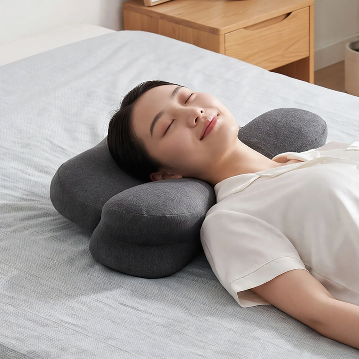 Ergonomic neck pillow made of memory foam, asymmetrical