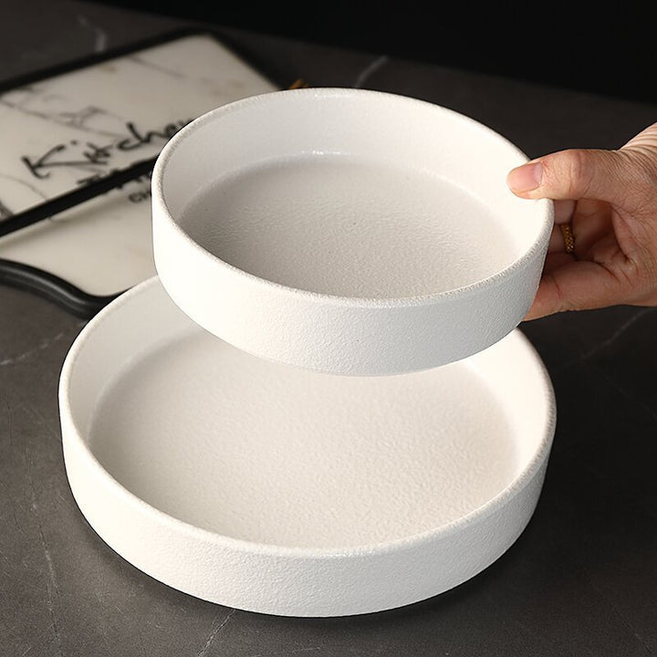 Stainless steel plate, round, 17–23 cm