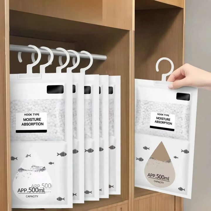 Hanging dehumidifier bag for wardrobes and rooms