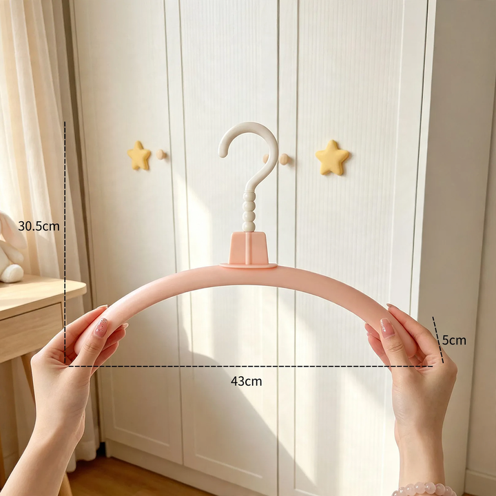 Plastic clothes hanger with monster design