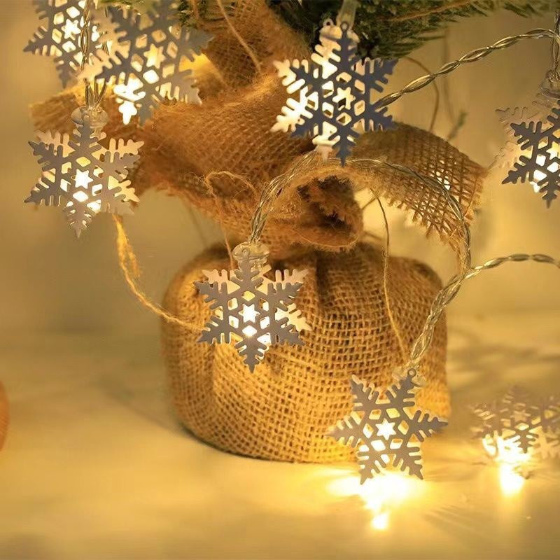 Decorative LED string lights with iron elements