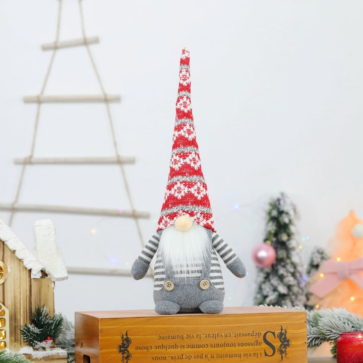 Christmas elf figure with knitted hat, sitting