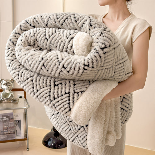 Patterned cuddle blanket with lamb fleece look