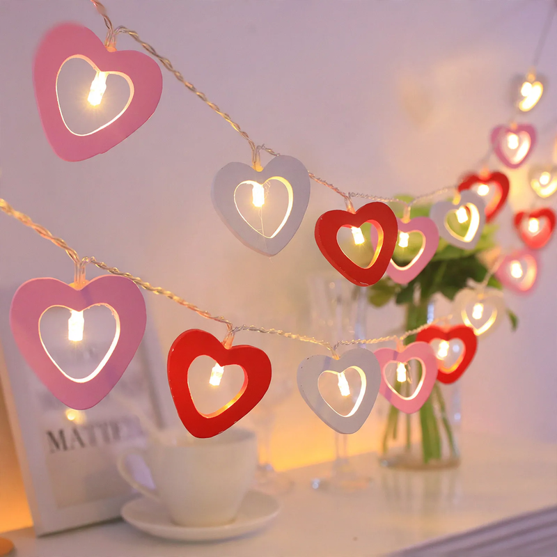 Decorative LED string lights with wooden motifs