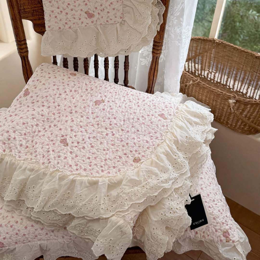 Cotton bedspread with lace trim, quilted