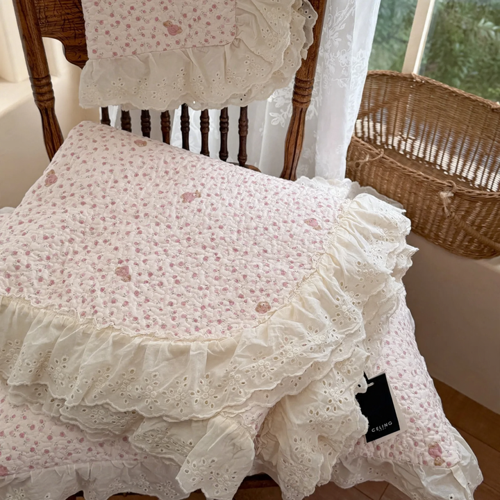 Cotton bedspread with lace trim, quilted
