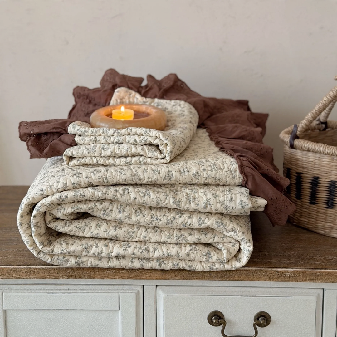 Cotton bedspread with lace trim, quilted