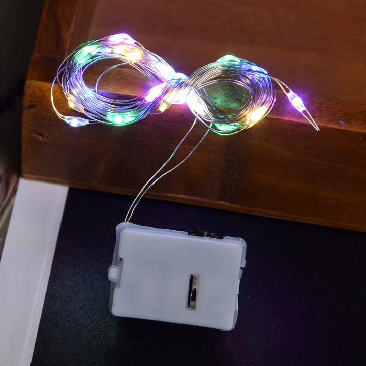 Compact LED string lights with battery operation