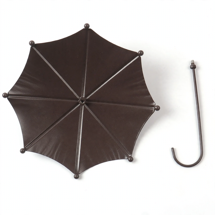Birdbath made of iron in umbrella shape