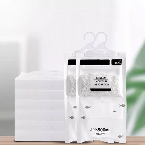 Hanging dehumidifying bag for cabinets and drawers