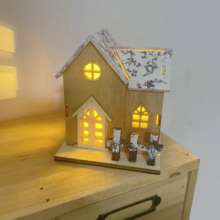Illuminated wooden cabin model for Christmas
