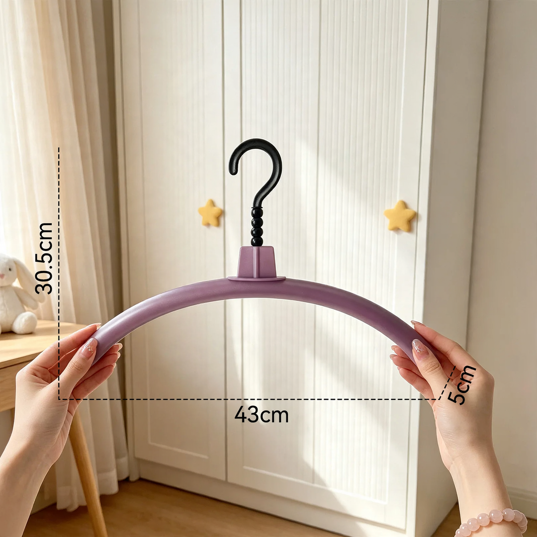 Plastic hanger with non-slip surface