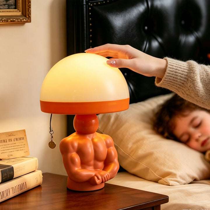 Mushroom table lamp with muscle figure