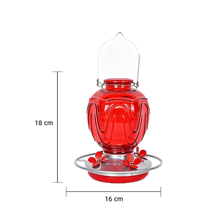 Glass bird feeder for the garden