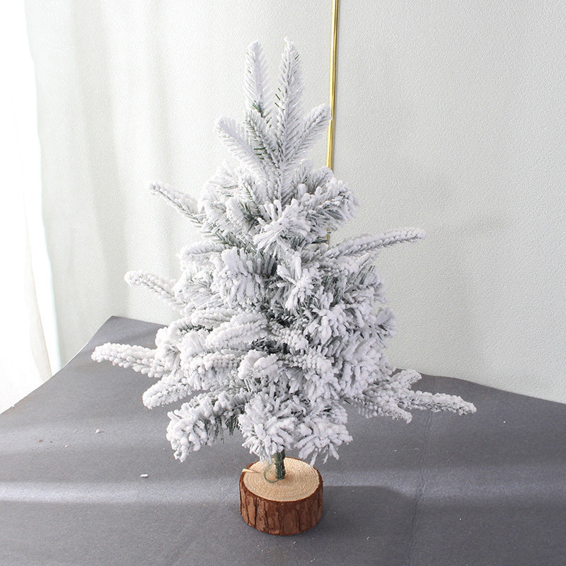 Mini Christmas tree for the table, snow-covered, with lighting