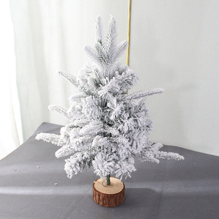Mini Christmas tree for the table, snow-covered, with lighting