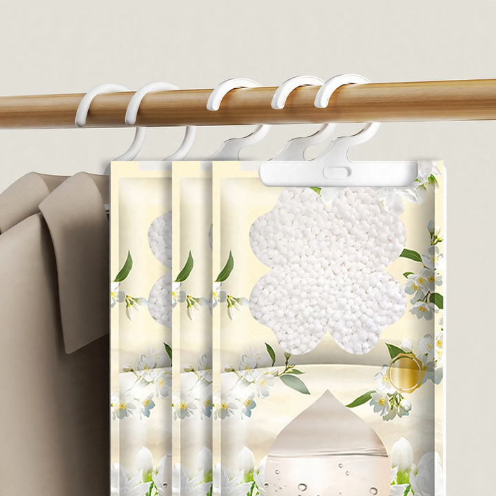 Hanging dehumidifier bag against moisture and mold