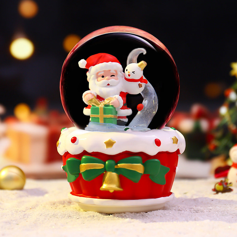 Illuminated snow globe with music and snow effect