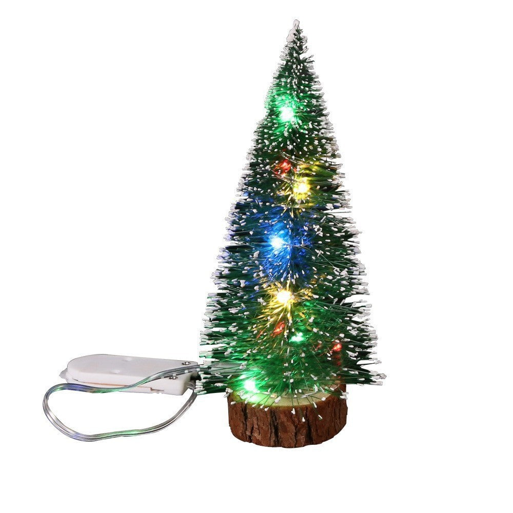 Miniature Christmas tree with snow look
