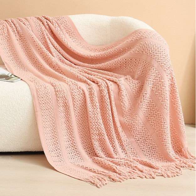 Decorative knitted blanket with fringes