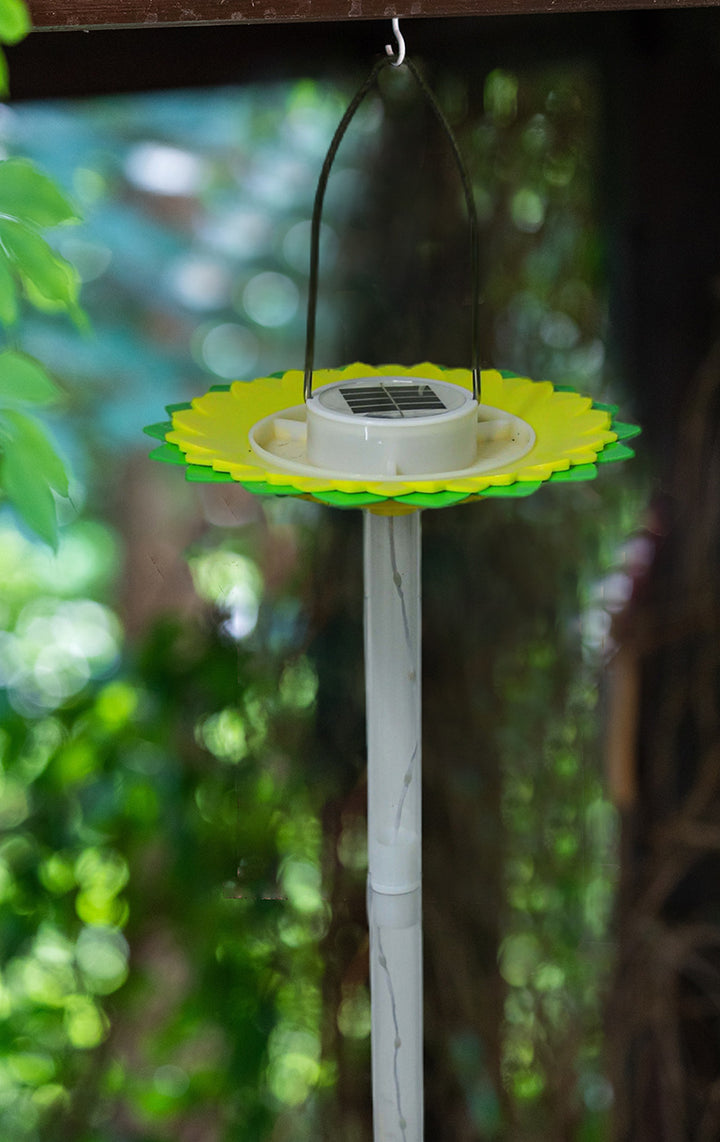 Solar-powered bird bath with LED garden light