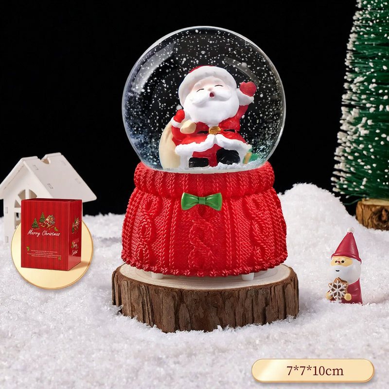 Christmas snow globe with music box and carriage design