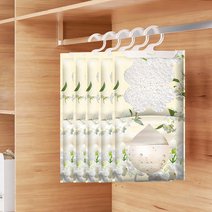 Hanging dehumidifier bag for wardrobes