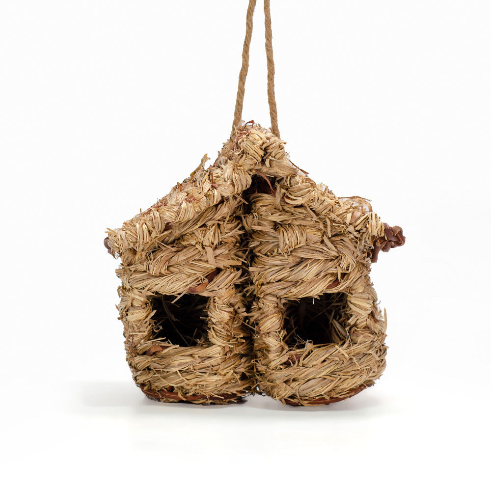 Handwoven birdhouse made of natural grass
