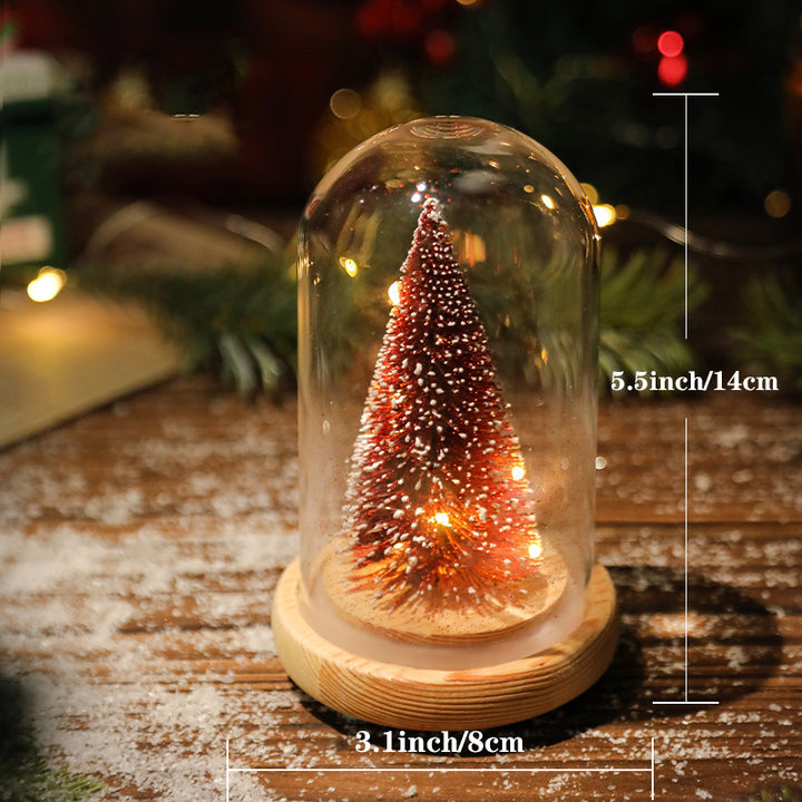 Illuminated wooden Christmas house for table decoration