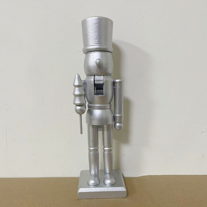 Nutcracker figure made of wood, silver-colored