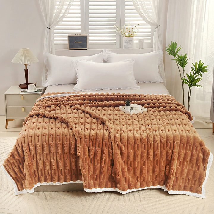 Warm cuddly blanket in fur look