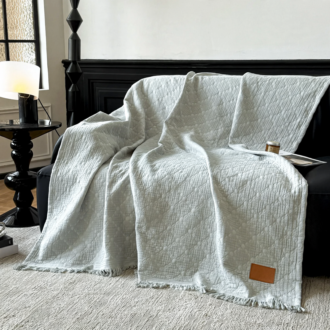 Cotton gauze blanket with tassels, versatile to use