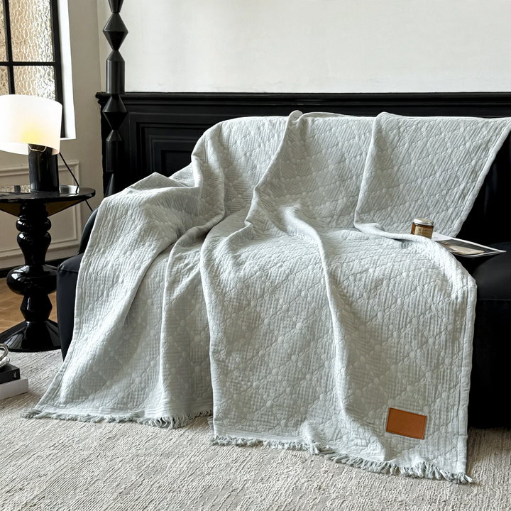 Cotton gauze blanket with tassels, versatile to use