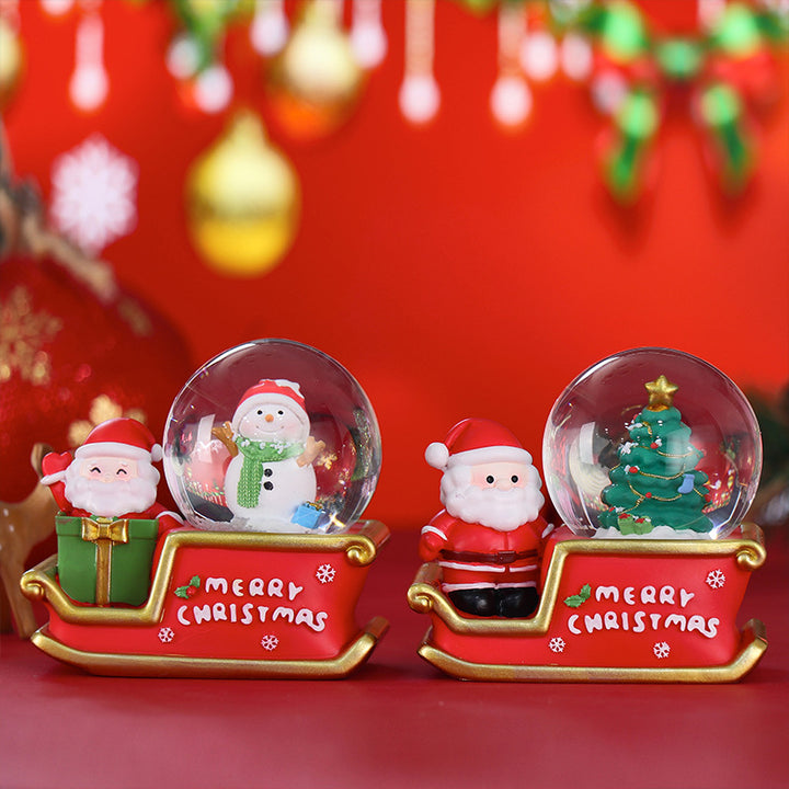 Christmas snow globe with lighting and glitter effect