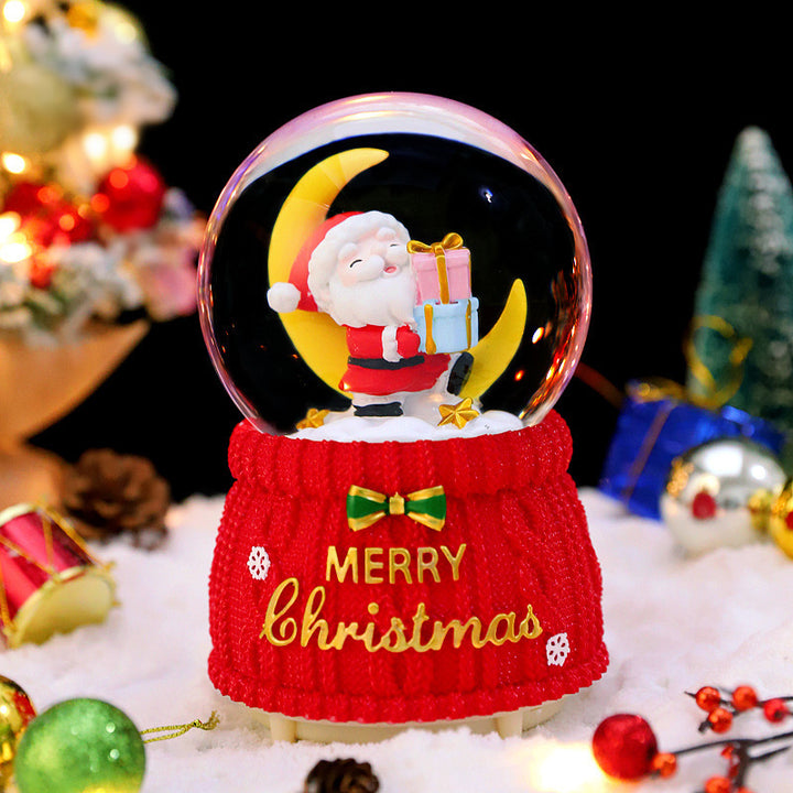 Illuminated snow globe with music and snow effect