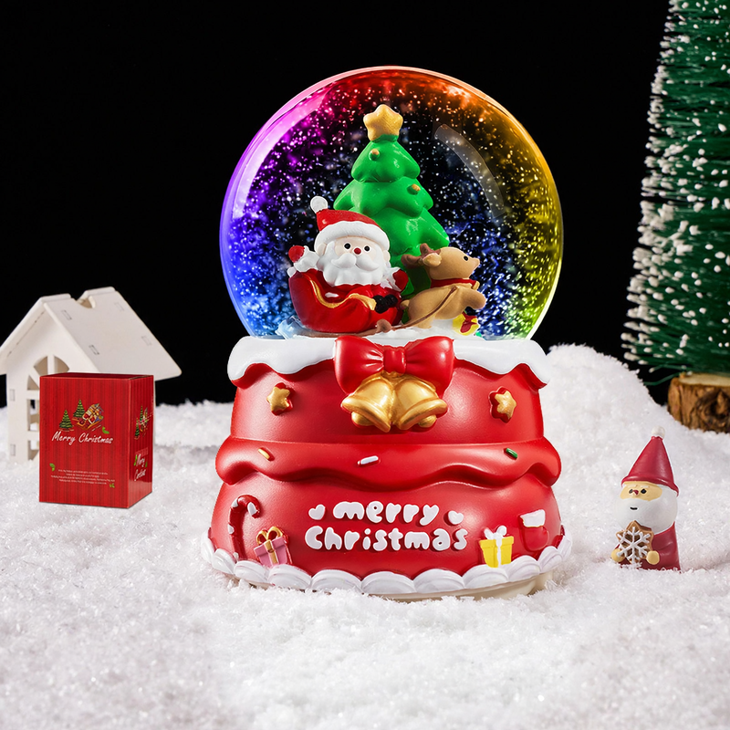 Christmas music box with snow globe effect